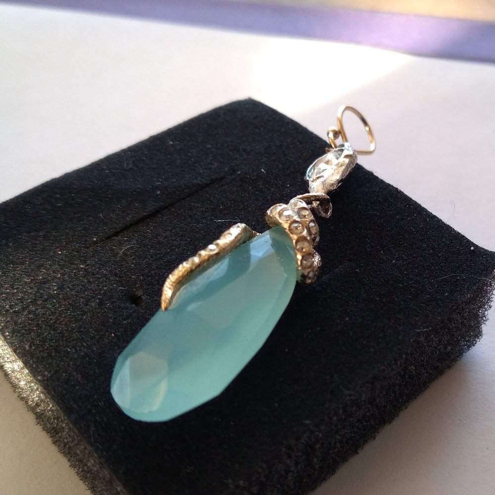 Aqua marine gemstone with gold twist and gemstone crystals pendant